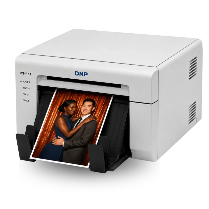 A print coming out of a photo printer driven by FMPrint